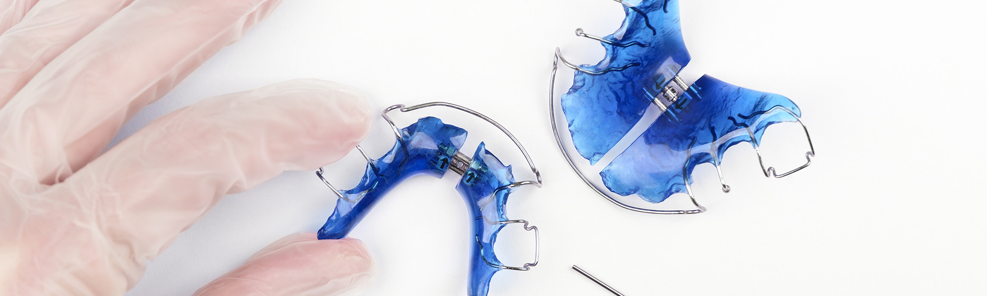 Why Orthodontic Retainers Are Essential: Keep Your Smile Straight All Year Long
